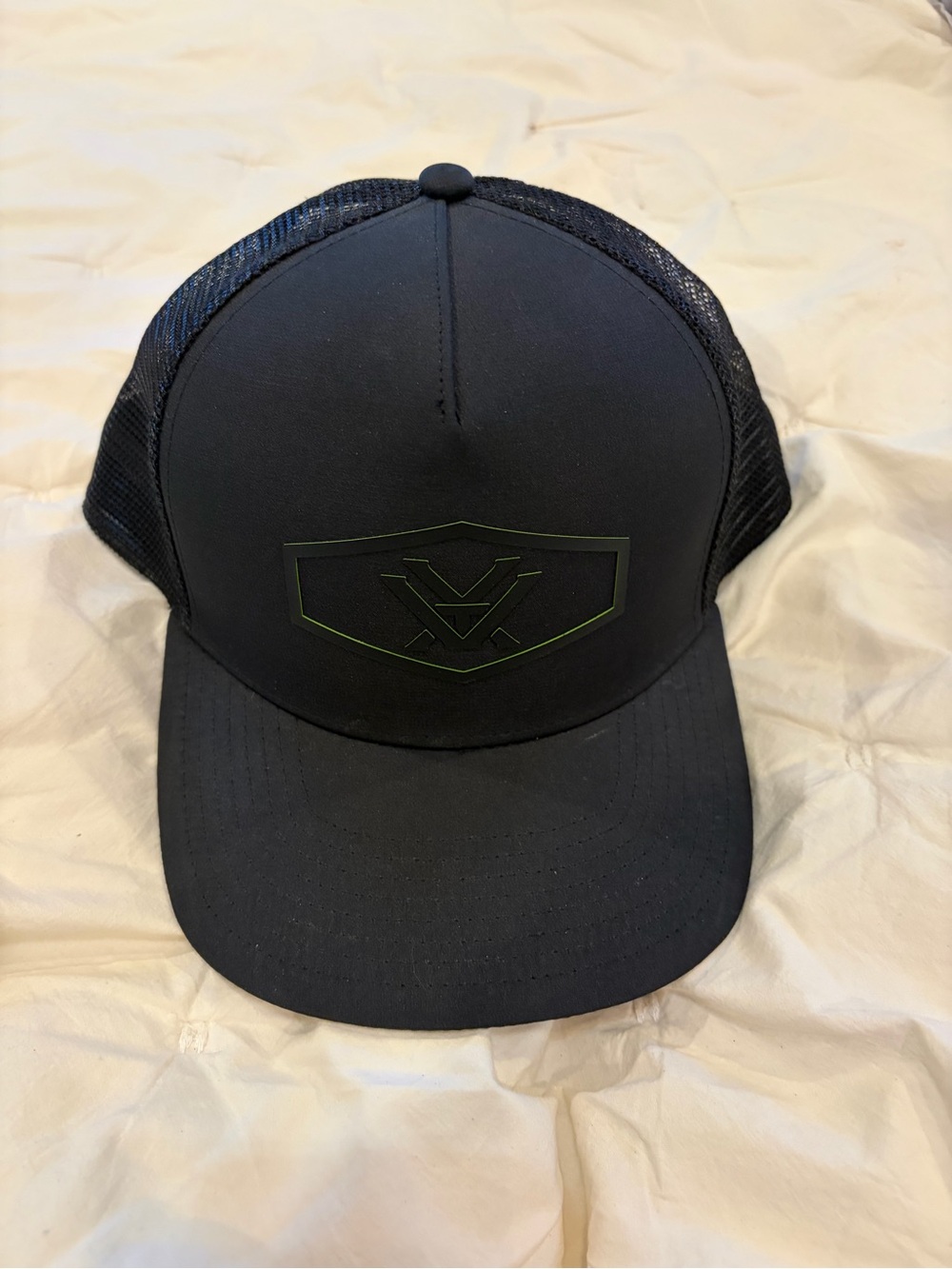 Black Trucker Hat with Subtle Green Logo